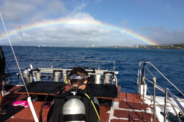 a boat is docked next to a body of water
