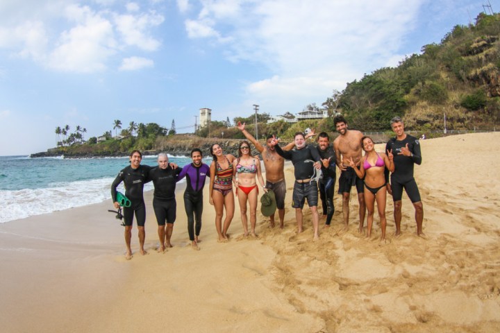 a group of people on a beach