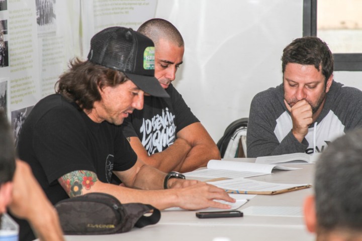 a group of people sitting at a table