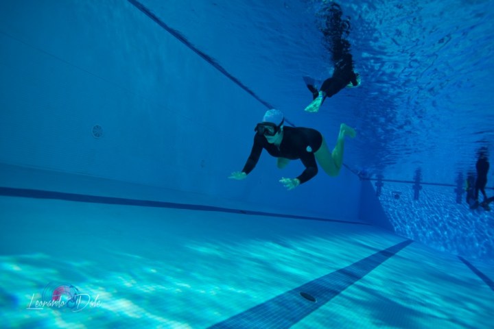 a person swimming in the water