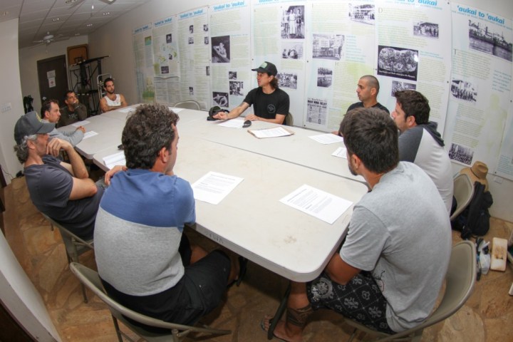 a group of people sitting at a table