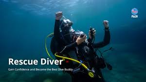 Two scuba divers practicing rescue skills underwater.
